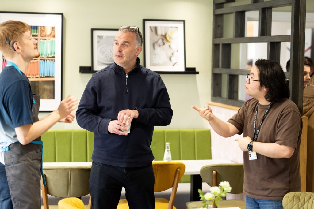 People talking at an event